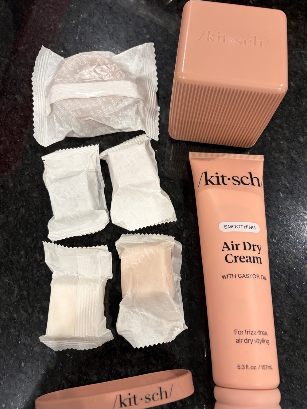 Kitsch shampoo, conditioner,body wash, styling cream, travel case and band.